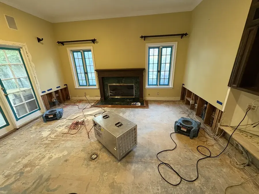Drying equipment running in a finished basement after a frozen-pipe burst in Northridge